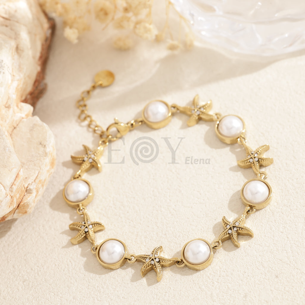 Pulsera estrellas marinas y perlas acero