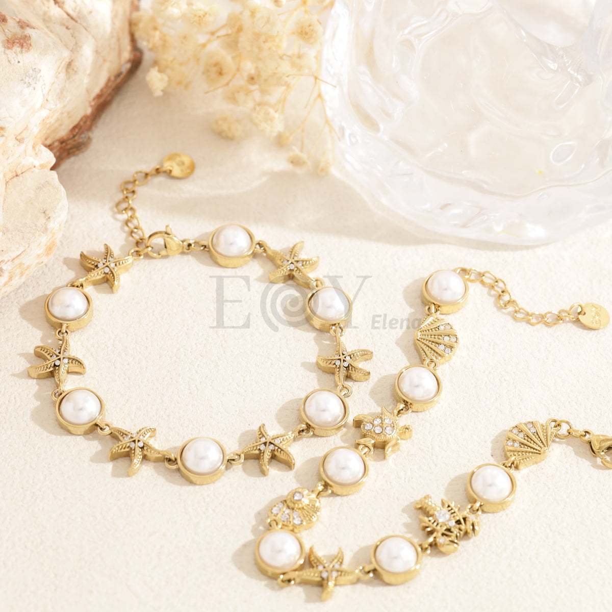 Pulsera charms marinos y perlas acero