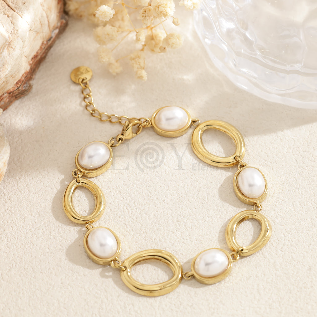 Pulseras aros y perlas