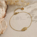 Pulsera de cadena dorada con mano de Fátima y circonita