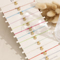 Pack pulsera cuerda con concha