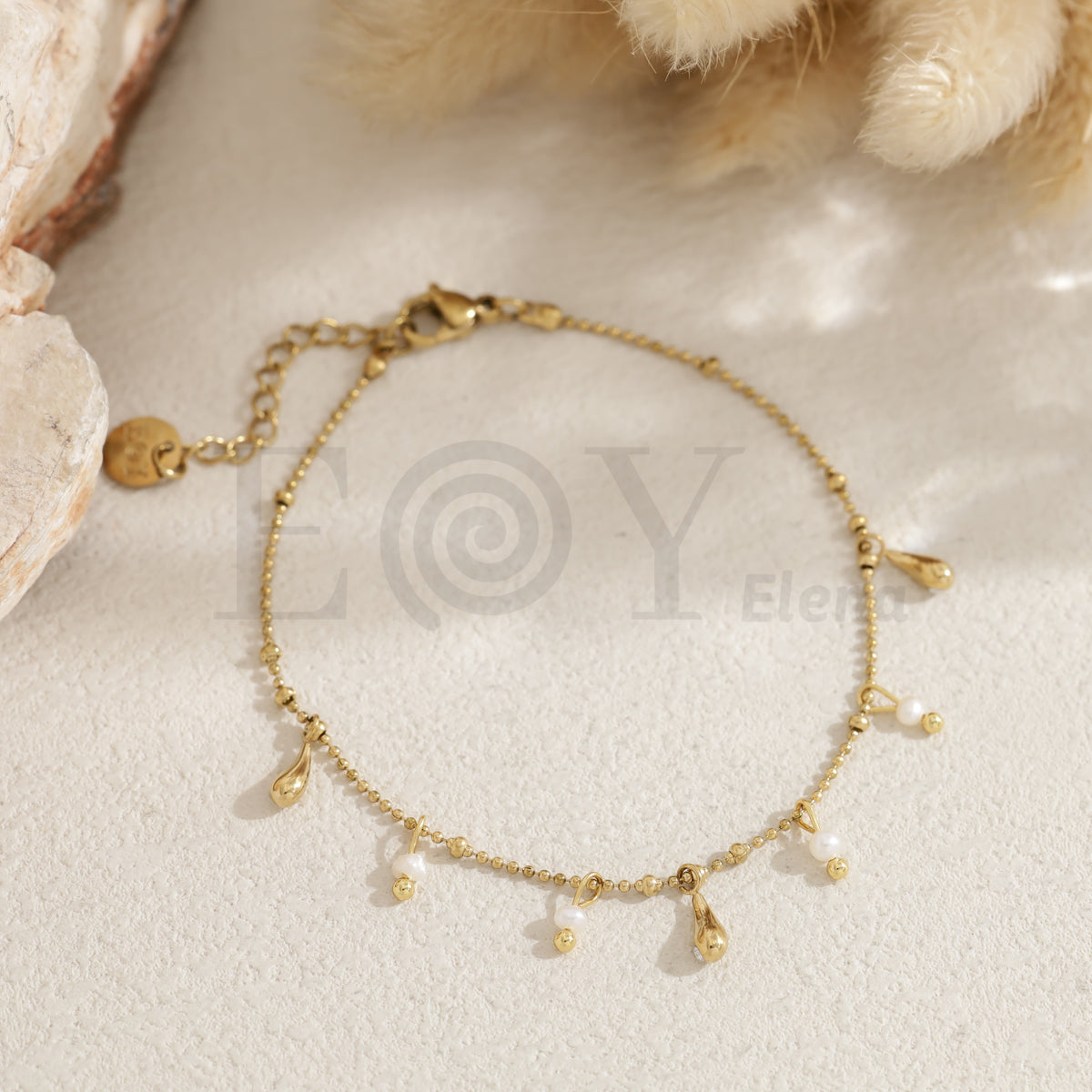 Pulsera de gotas con perlas de acero