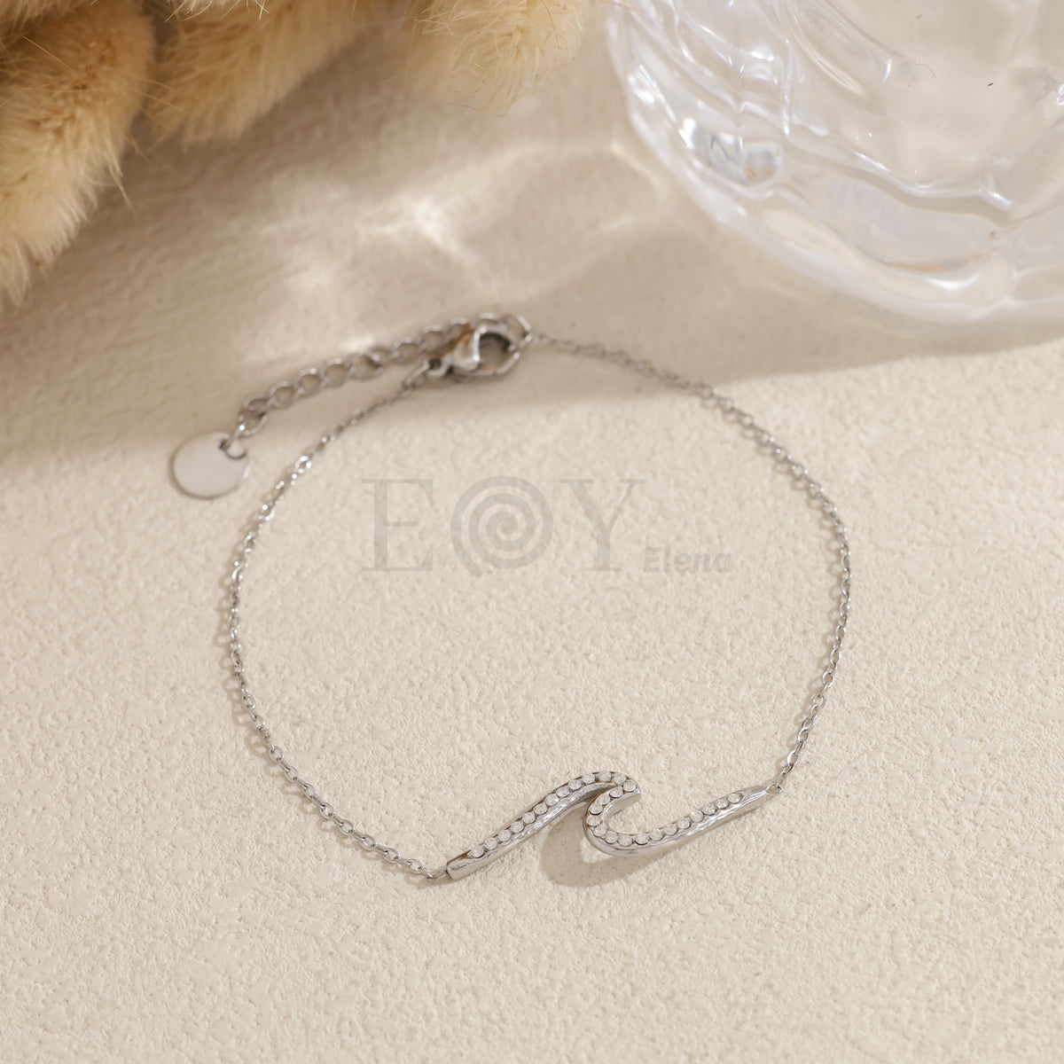 Pulsera ola con circonitas acero