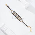 Pulsera piedras oscuras circonitas cuadradas