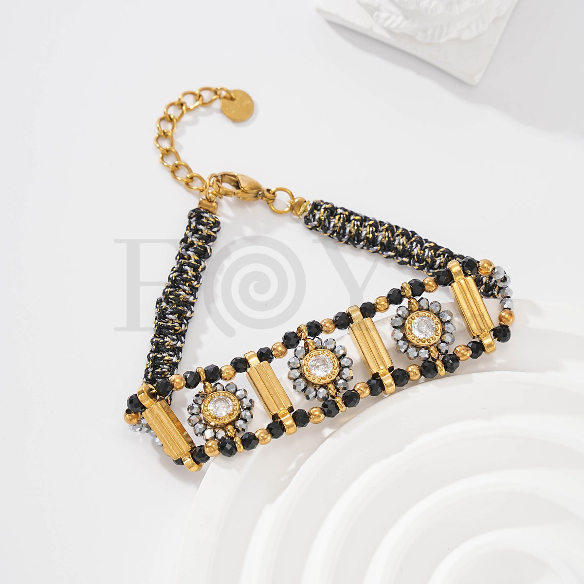 Pulsera de hilo con circonitas de acero