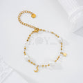 Pulsera con perlas, estrella y luna acero
