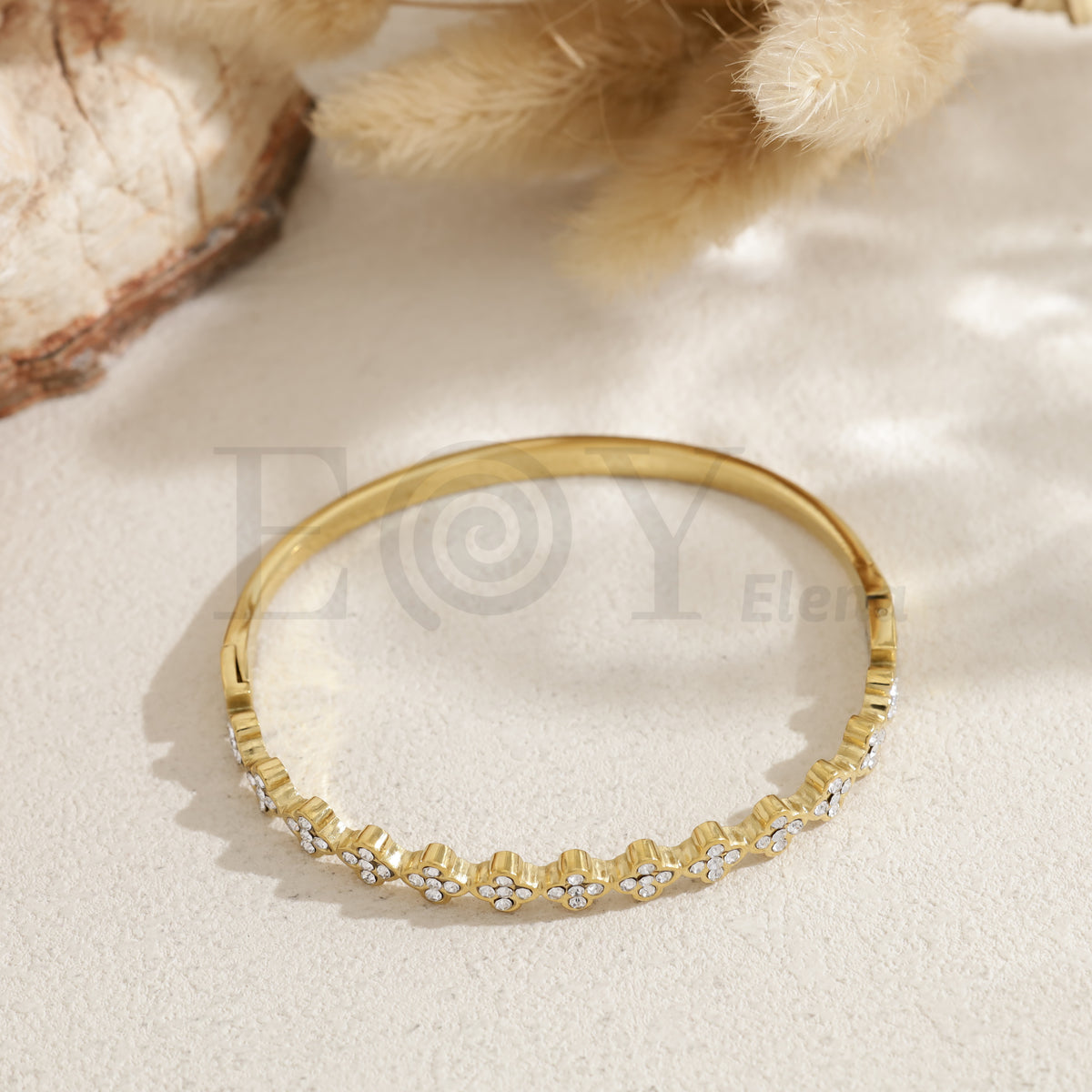 Brazalete tréboles acero