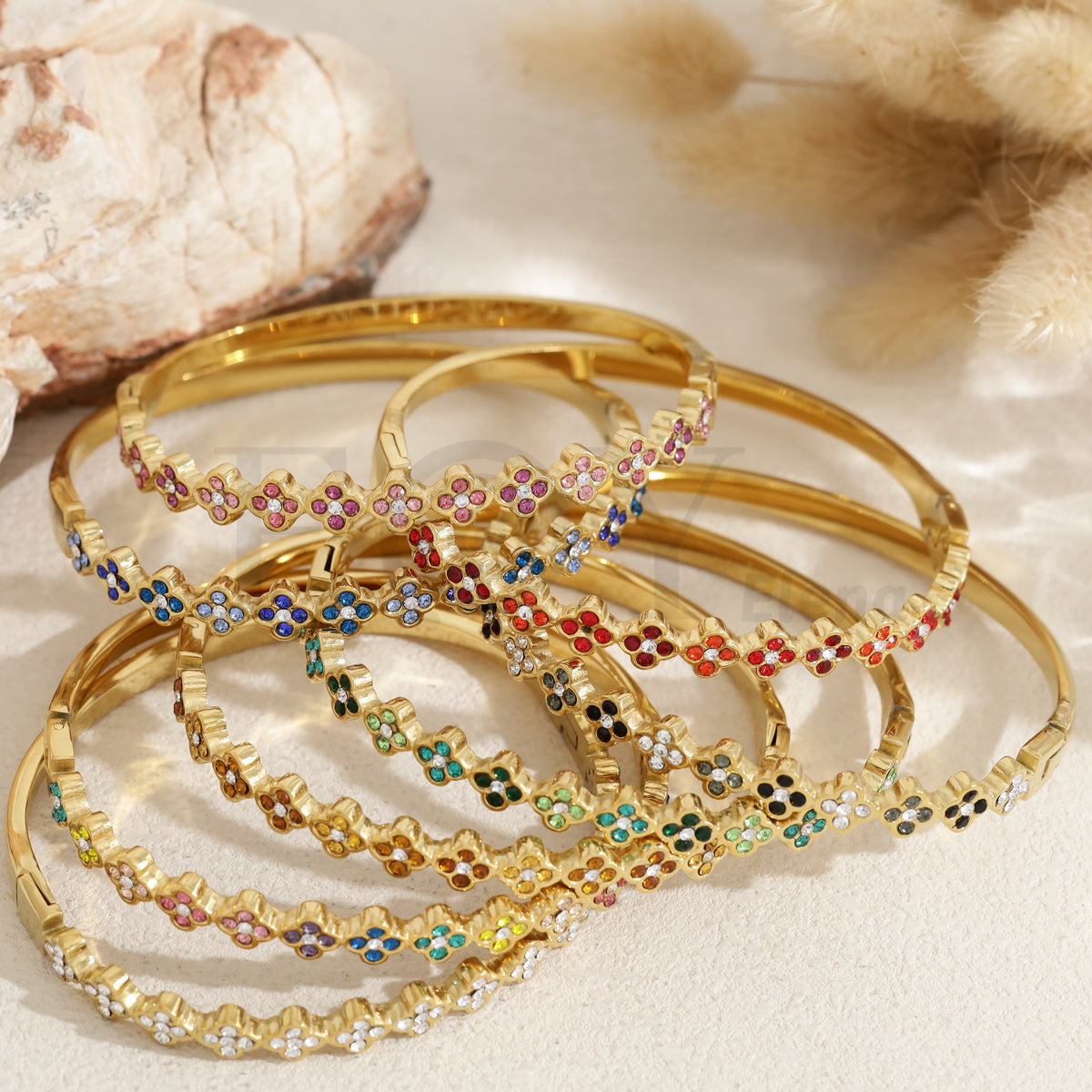 Brazalete tréboles acero