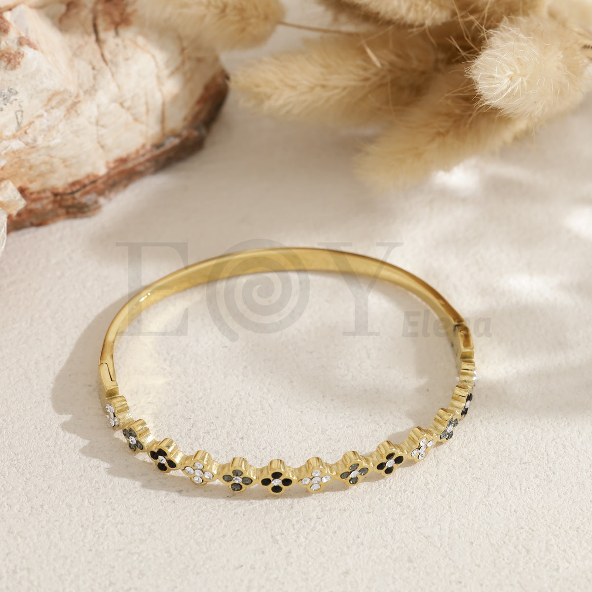 Brazalete tréboles acero