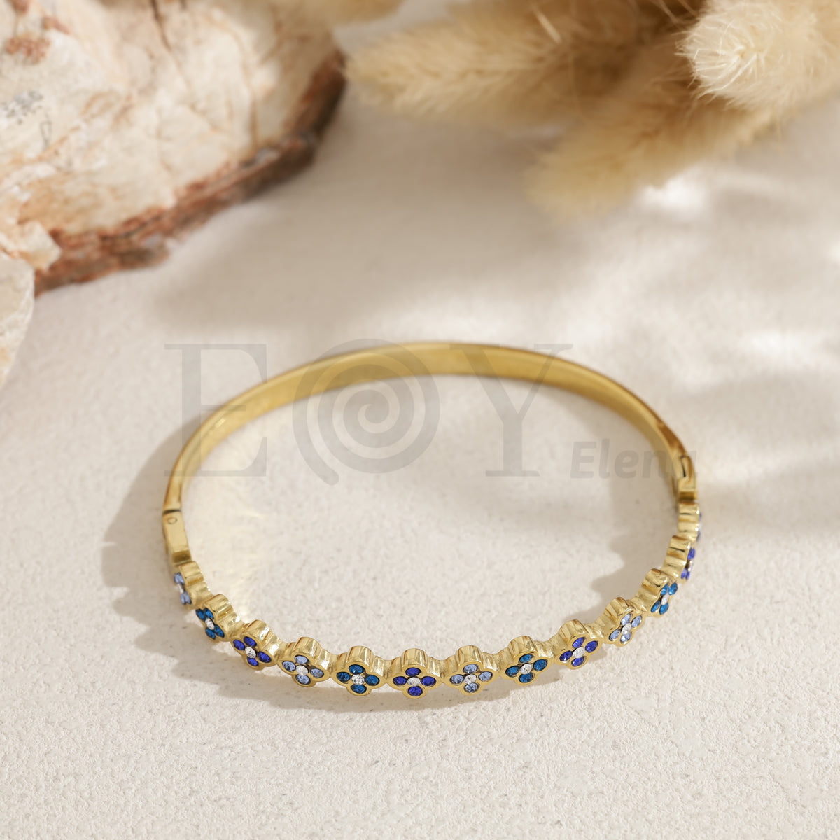 Brazalete tréboles acero
