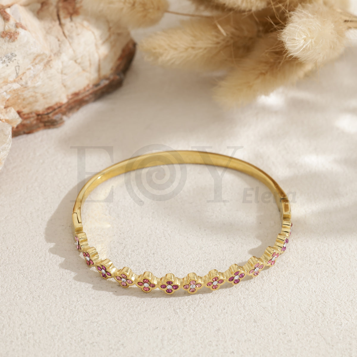 Brazalete tréboles acero