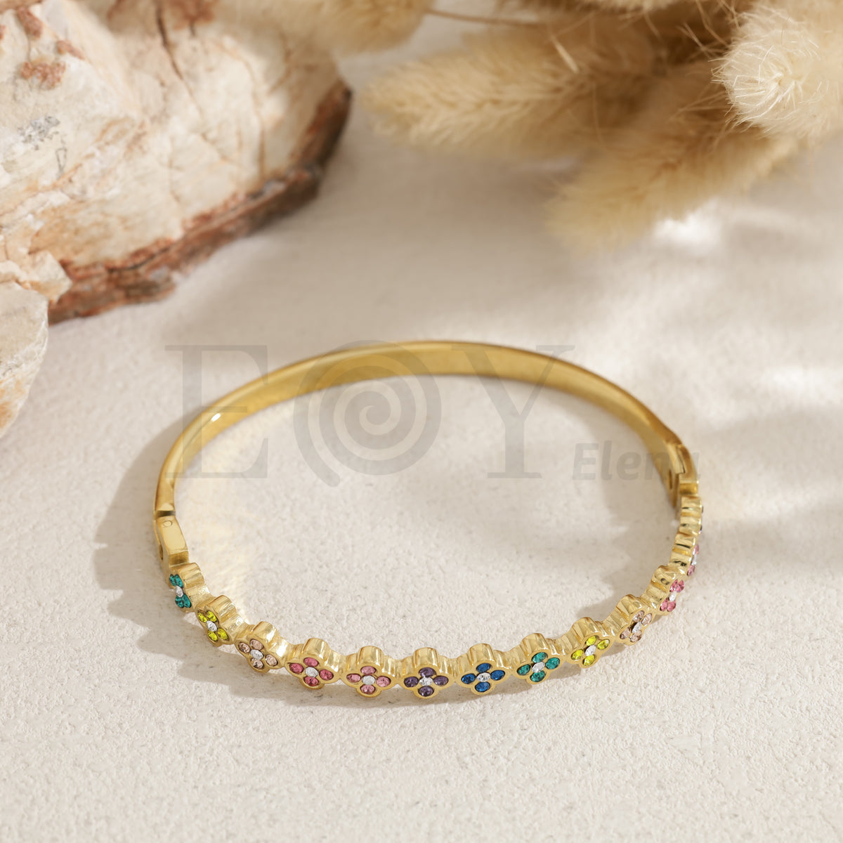 Brazalete tréboles acero
