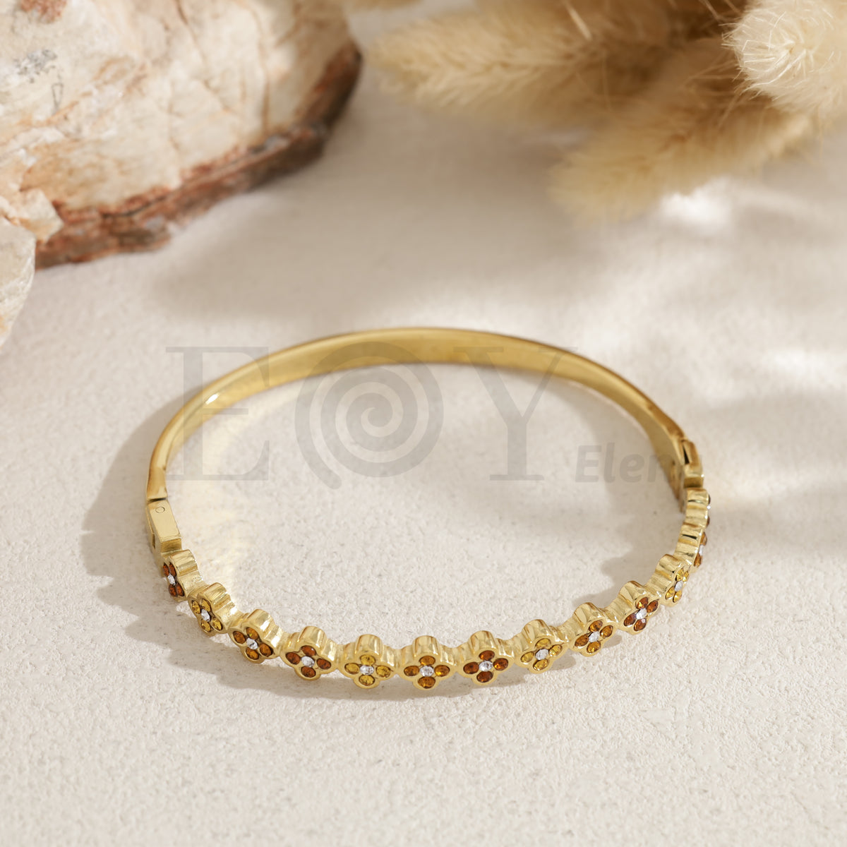 Brazalete tréboles acero