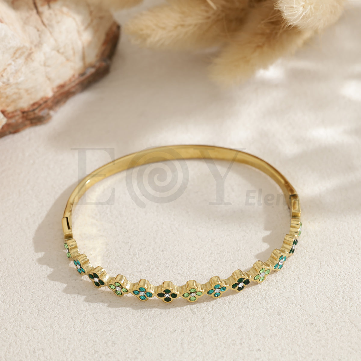 Brazalete tréboles acero