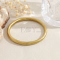 Brazalete rígido dorado