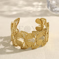Brazalete abierto con mariposas caladas