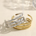 Brazalete abierto de tres bandas