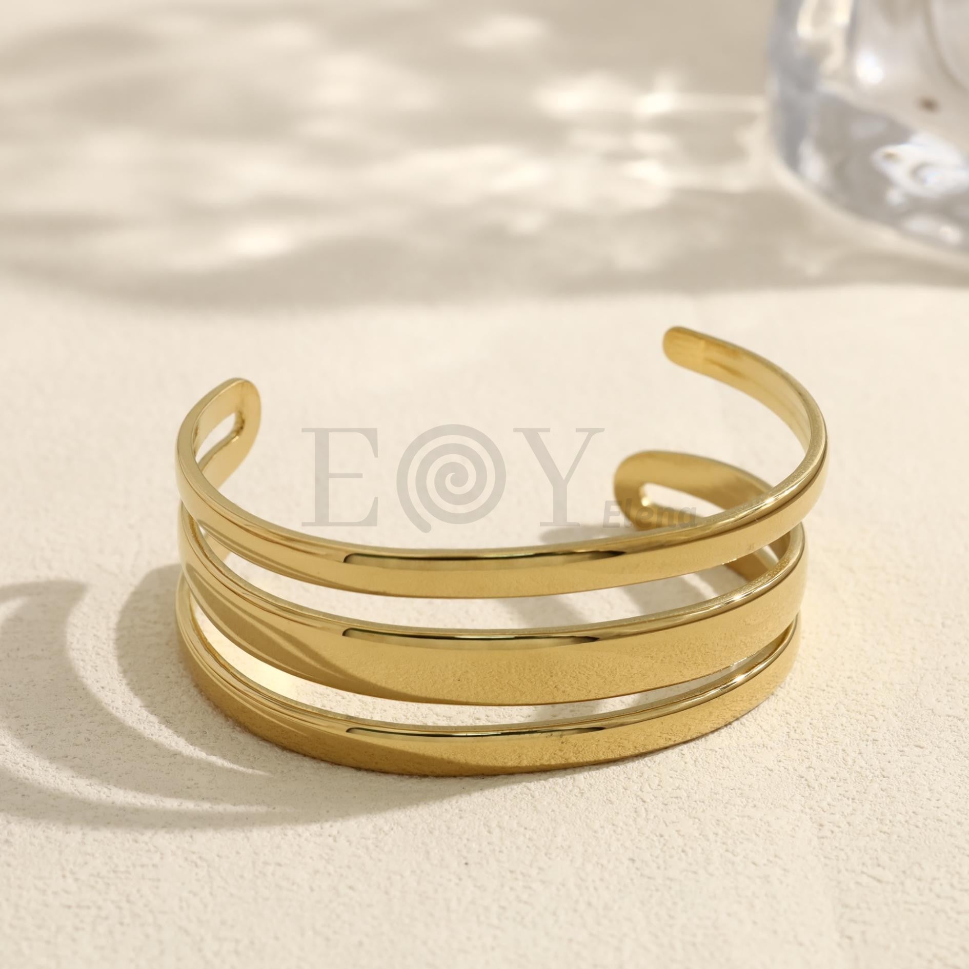 Brazalete abierto de tres bandas