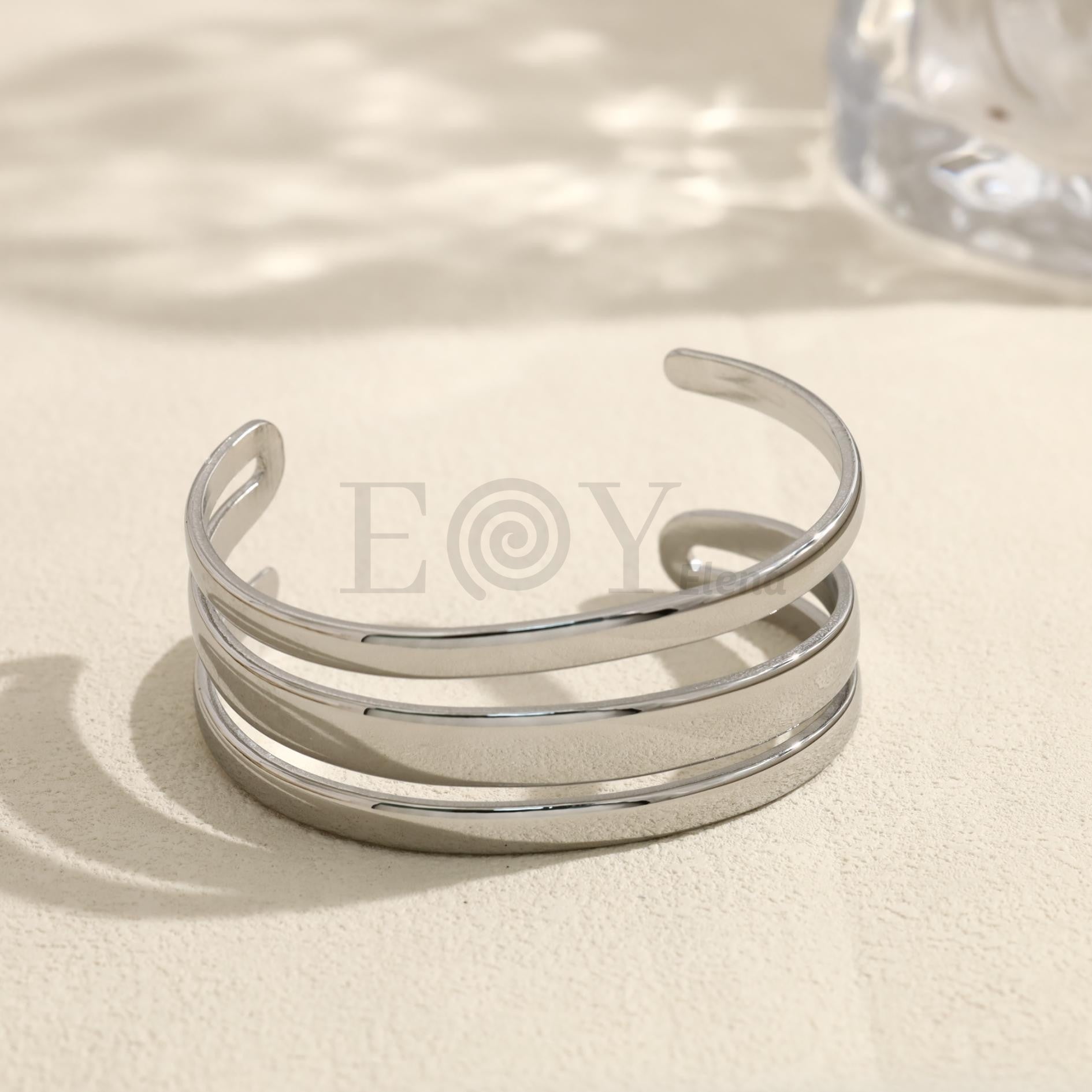Brazalete abierto de tres bandas