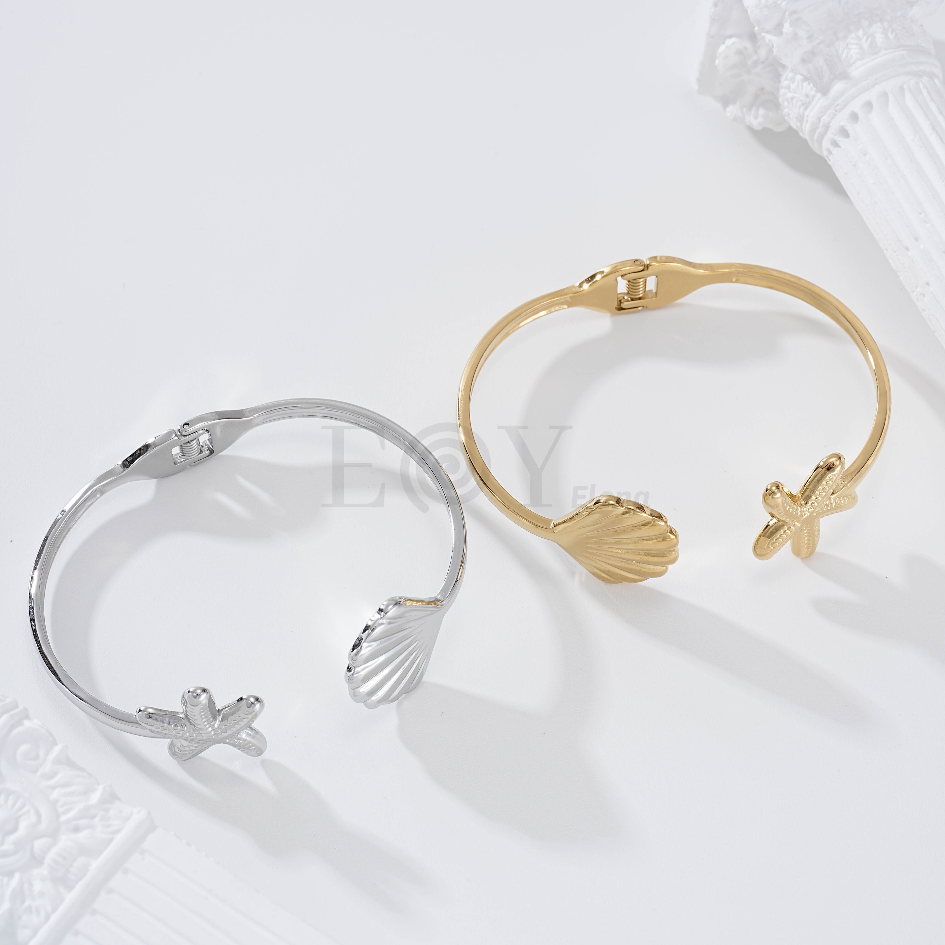 Brazalete estrella de mar y concha acero
