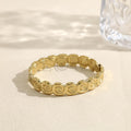 Brazalete con discos en espiral