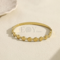 Brazalete conchas y circonitas