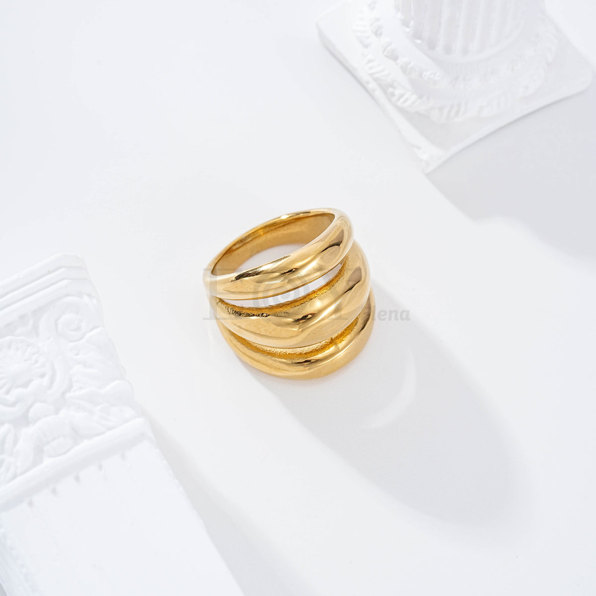 Anillo triple fila