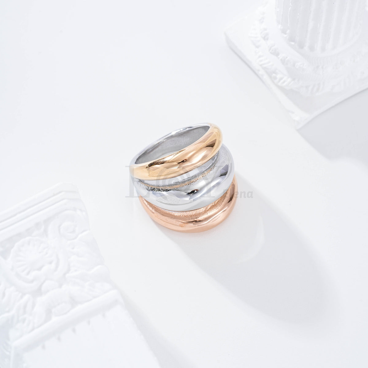 Anillo triple fila