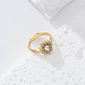 Anillo ajustable flor circonitas acero