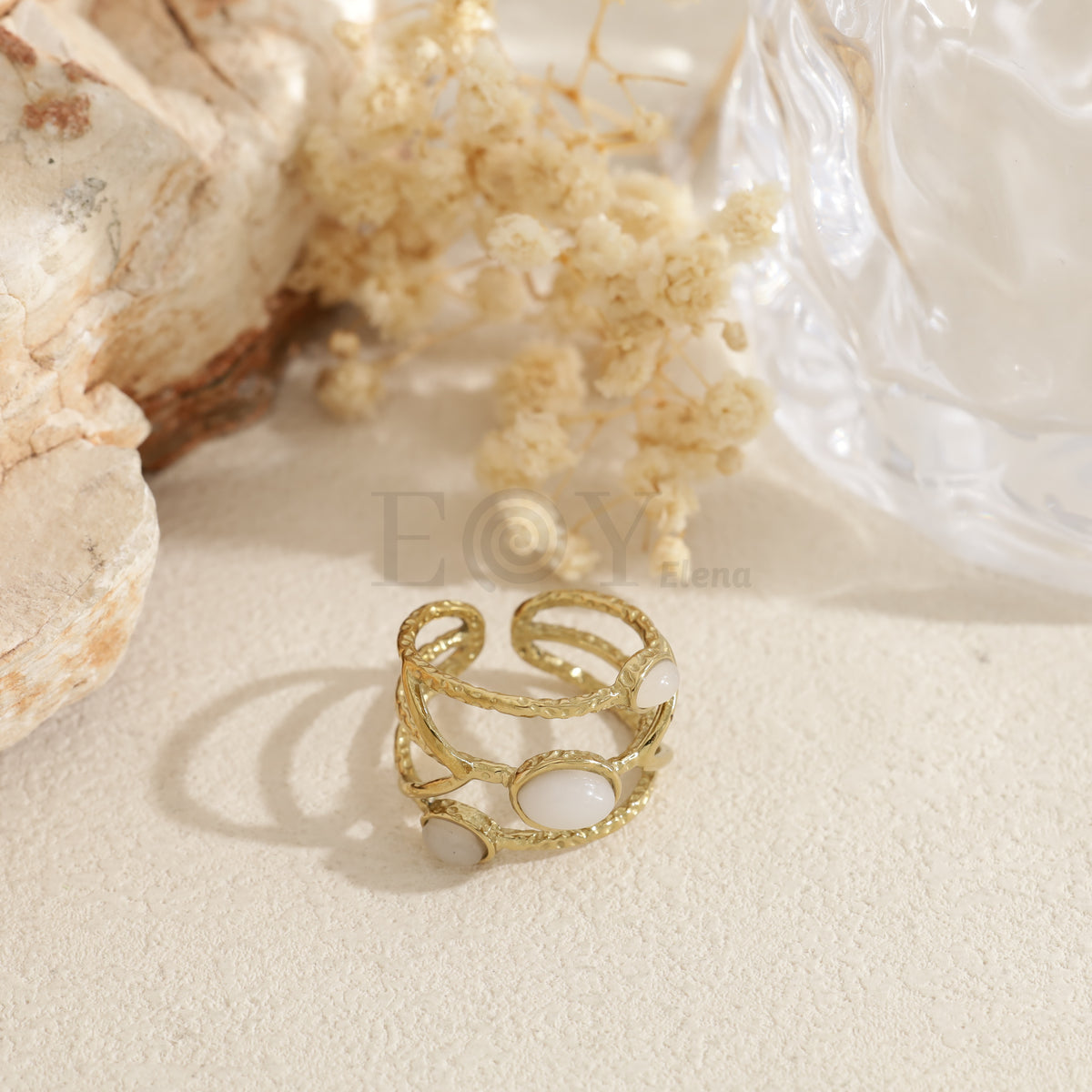 Anillo triple piedra color acero