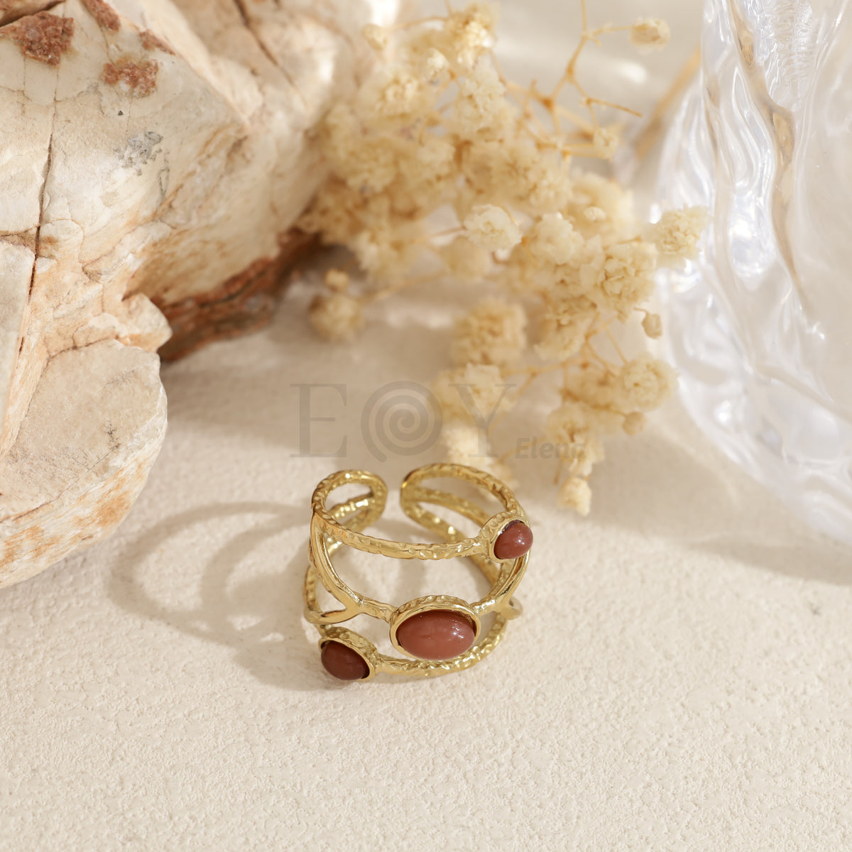 Anillo triple piedra color acero