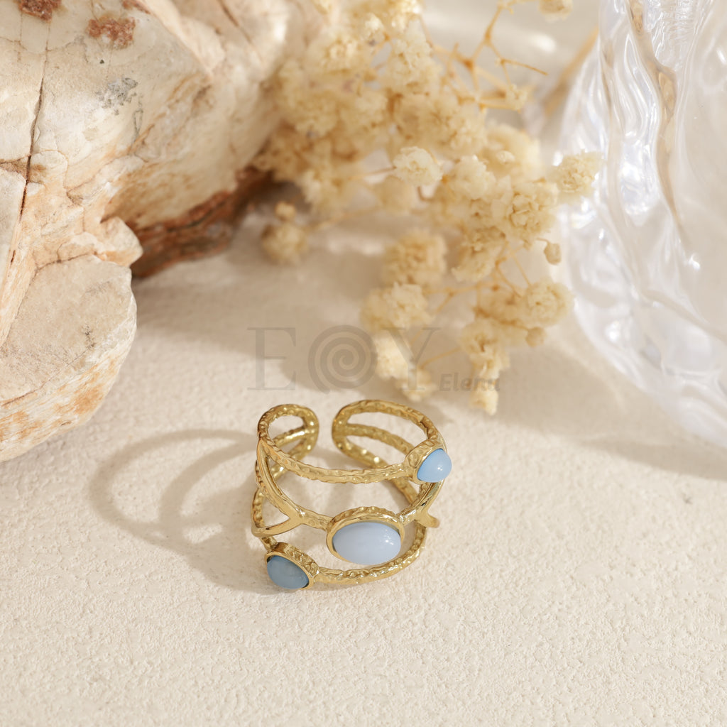 Anillo triple piedra color acero