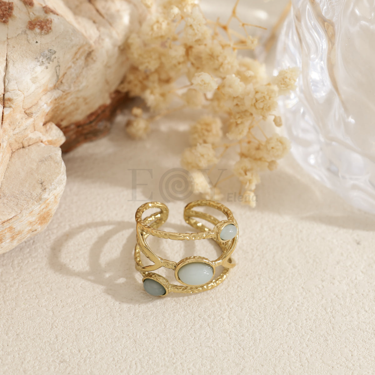 Anillo triple piedra color acero