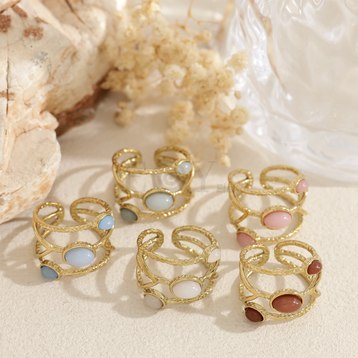 Anillo triple piedra color acero