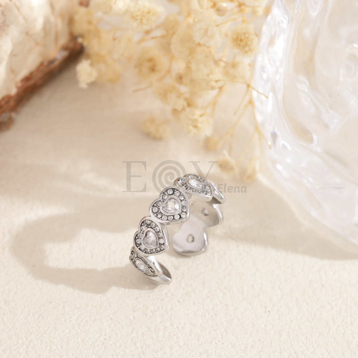 Anillo corazones circonitas acero